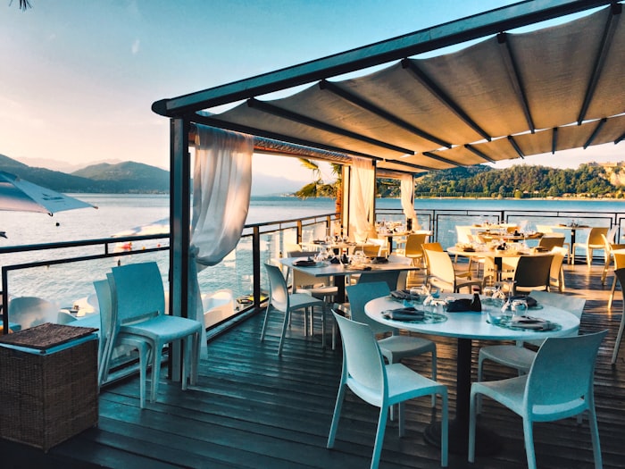 Sunlit terrace by the water