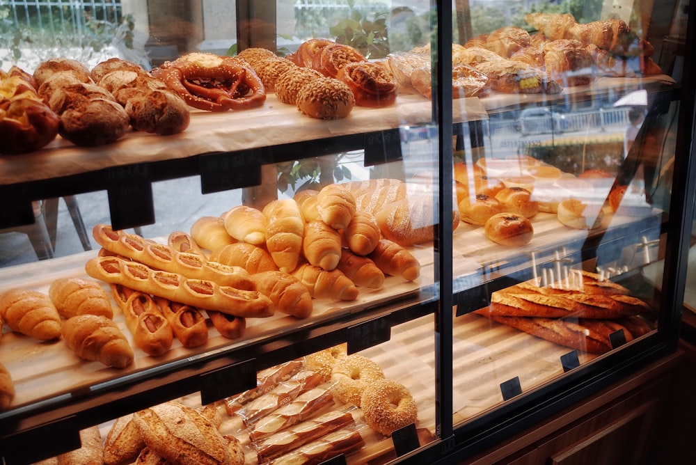 Laminated croissant dough being folded by hand